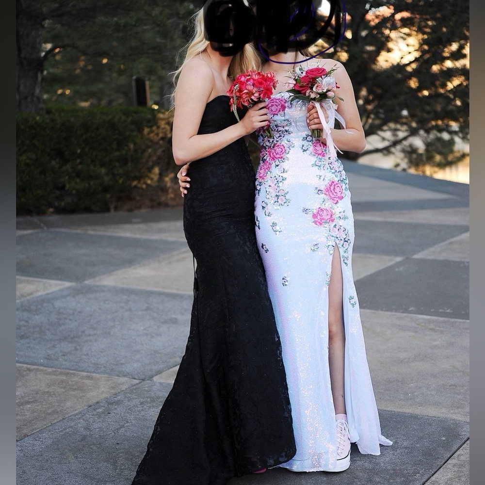 Black flowy dress with pretty lace details and sparkles only worn once!